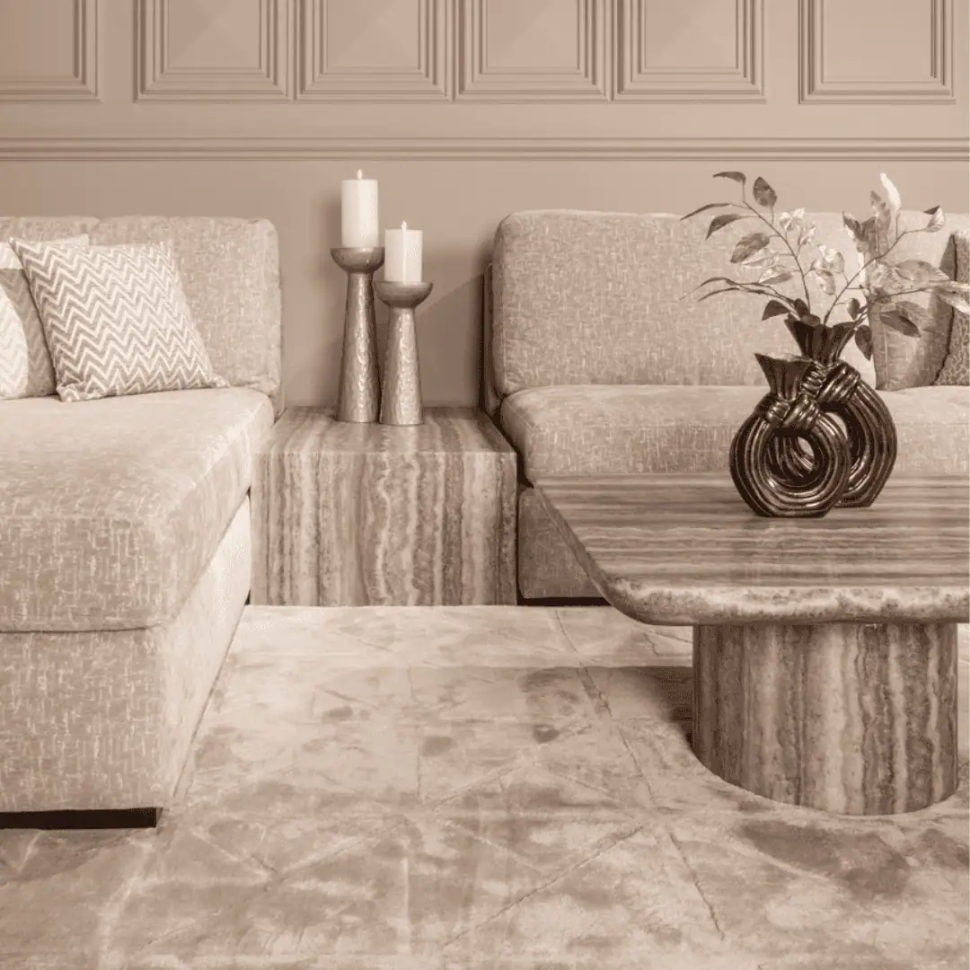 Luxurious living room with beige sofas and decorative accessories.