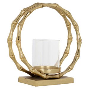 Goldfarbenes „ windlicht “ mit Glaskerze in einem dekorativen Rahmen.