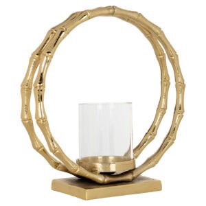 Lampe ouragan » dorée Lampe ouragan un bougeoir en verre et un anneau décoratif rond.