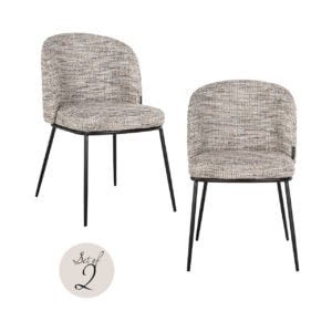 Set of 2 Elvi dining chairs with a trendy nature print and black legs.