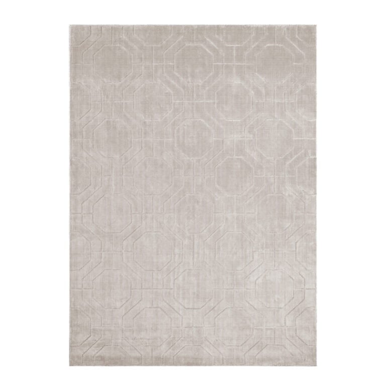 Licht ivoor vloerkleed met geometrisch patroon van Richmond Interiors.