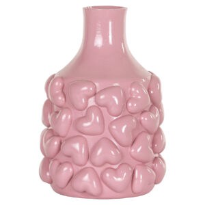 Pink vase with heart-shaped decorations for home decor.