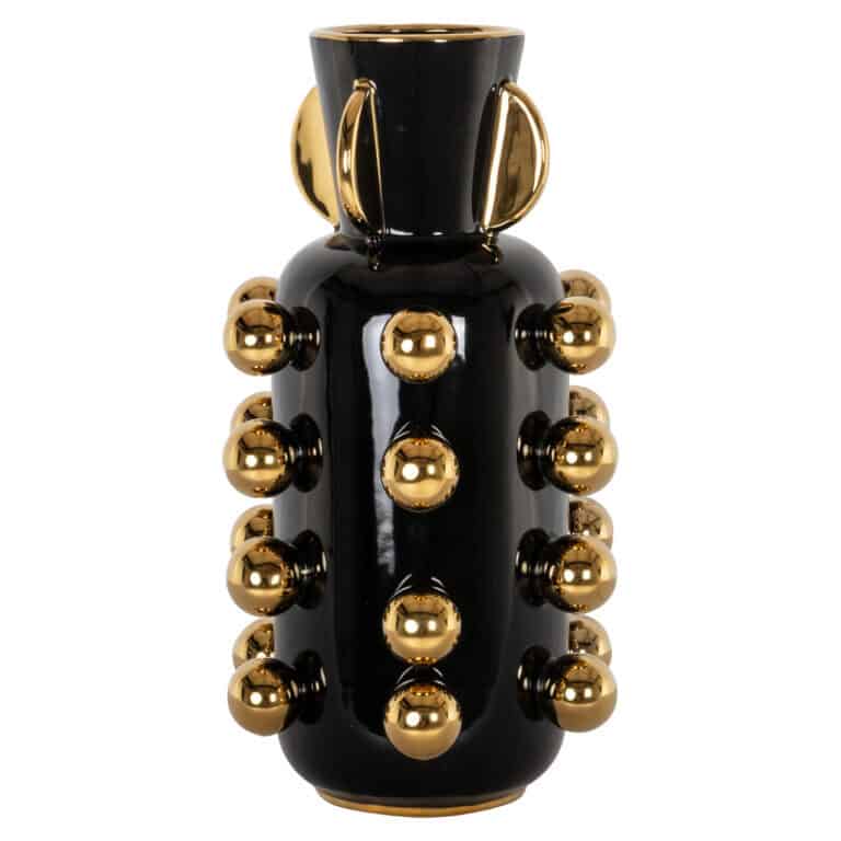 Zwarte vaas met gouden bolletjes en handvatten, modern design.