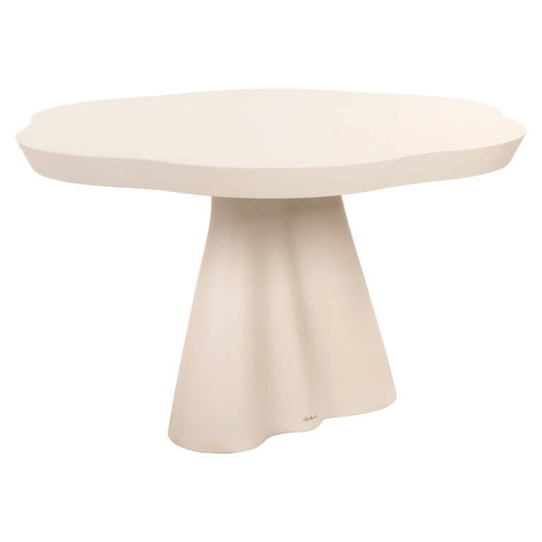 Modern sandstone outdoor dining table with a unique design.