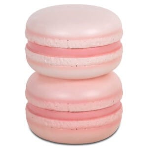 Pink macarons as a side table for interior decoration.