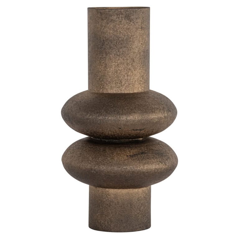 Modern gold vase with rounded shapes for interior decoration.