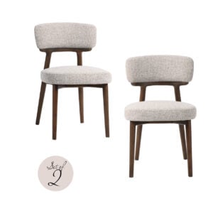 Set of two Basker dining chairs with wooden legs and light-colored upholstery.