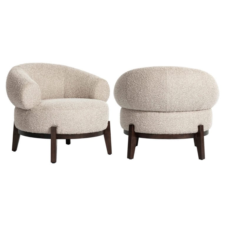Montana Lounge chair with soft, natural upholstery and wooden legs.