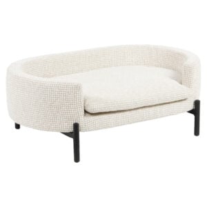 Dolly luxury dog bed in beige blockweave fabric with black wooden legs.
