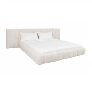 Lit blanc aux détails surpiqués et au revêtement moelleux, pour une chambre à coucher élégante.