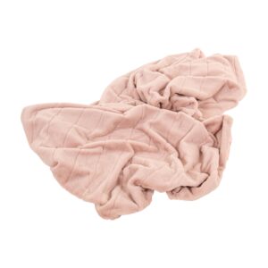 Zacht roze luxe plaid deken voor interieurdecoratie.