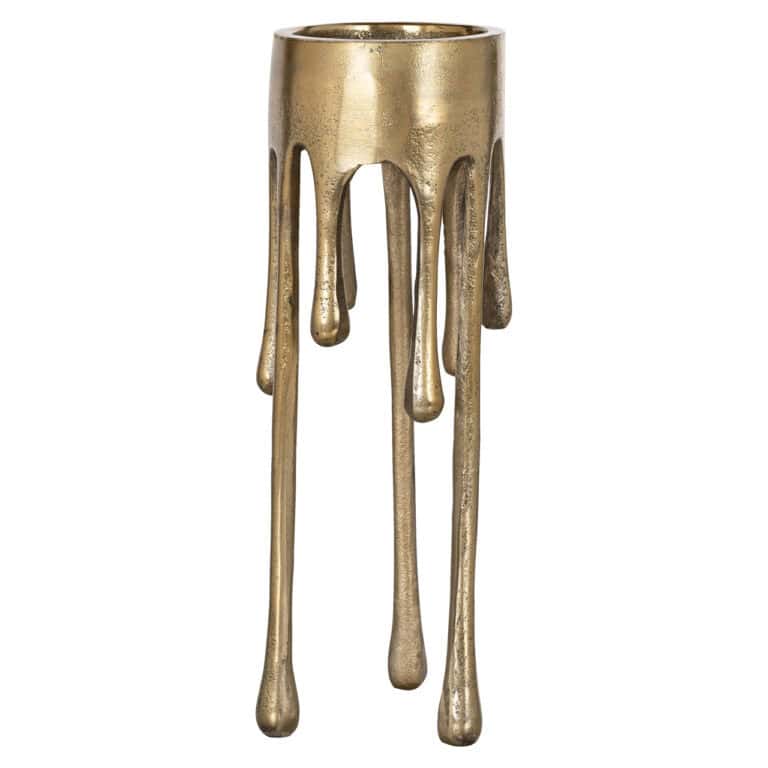 Brushed gold Candle holder with teardrop-shaped details for interior decoration.