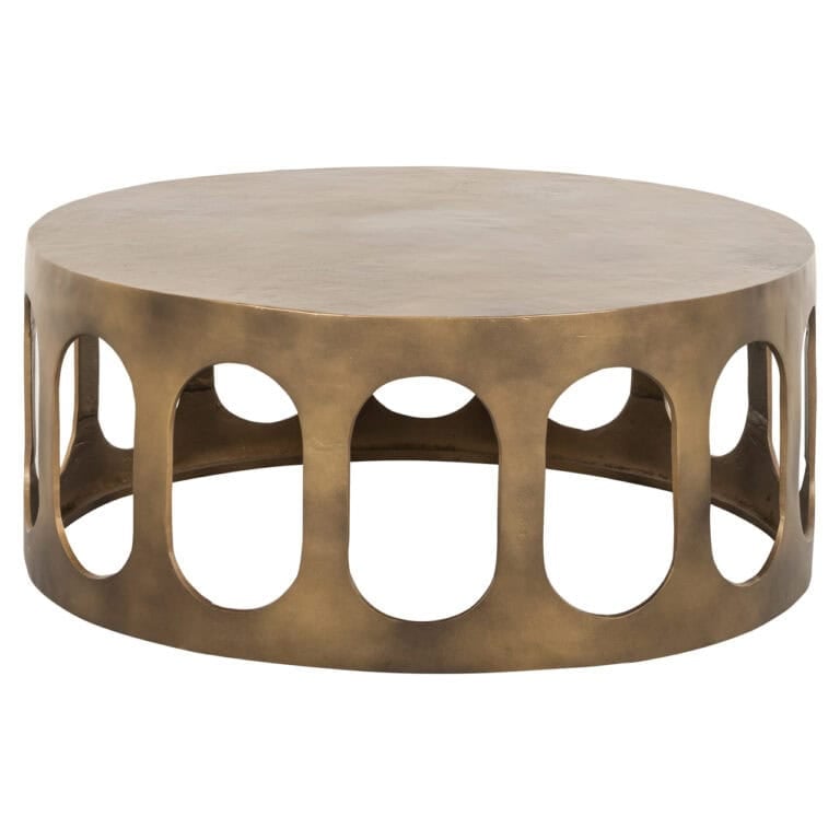 Brass  Table de salon doré avec des ouvertures rondes, au design moderne.