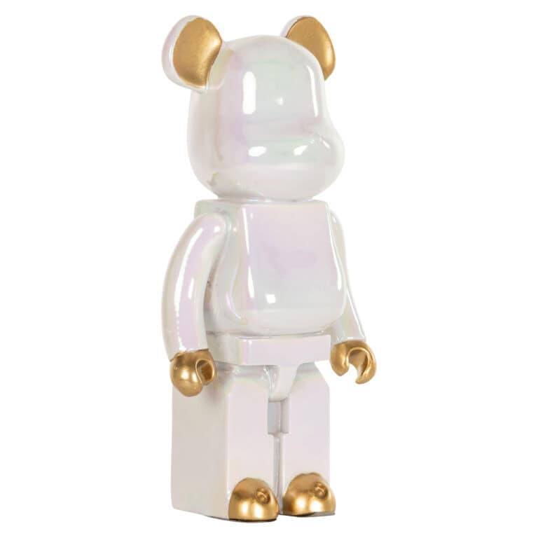 Decoratief bear-figuur in wit met gouden details voor interieurdecoratie.