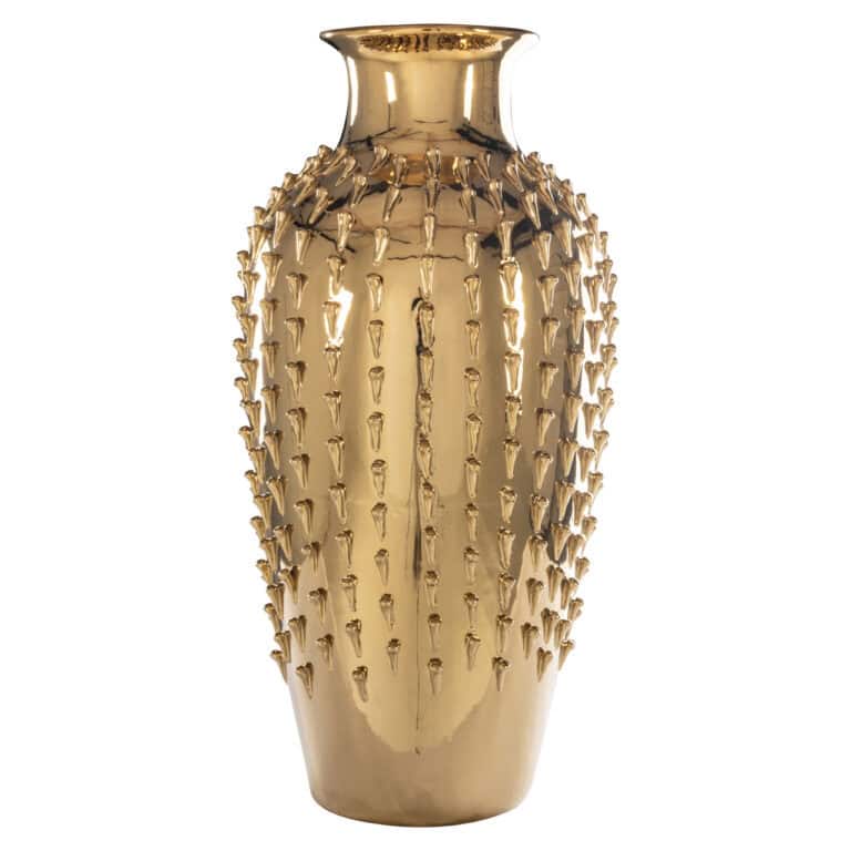 Vase doré à la texture et au motif décoratif.
