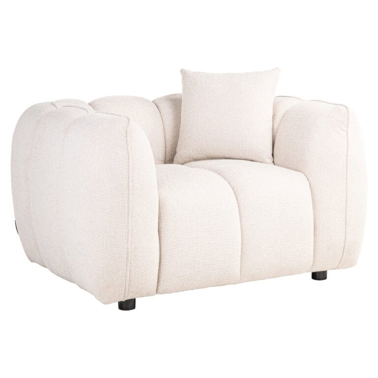 Chaise e lounge de luxe Jezebel, de couleur crème, avec des coussins confortables.