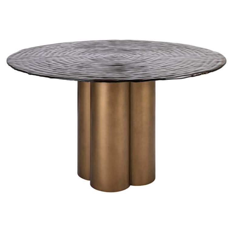 Table à dîner Glastonburry, avec une finition dorée antique et un design unique.