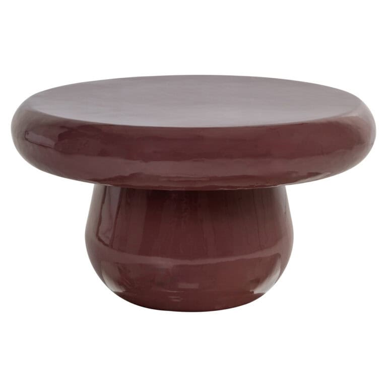 Sable-brauner Couchtisch mit runder Form und glänzender Oberfläche.