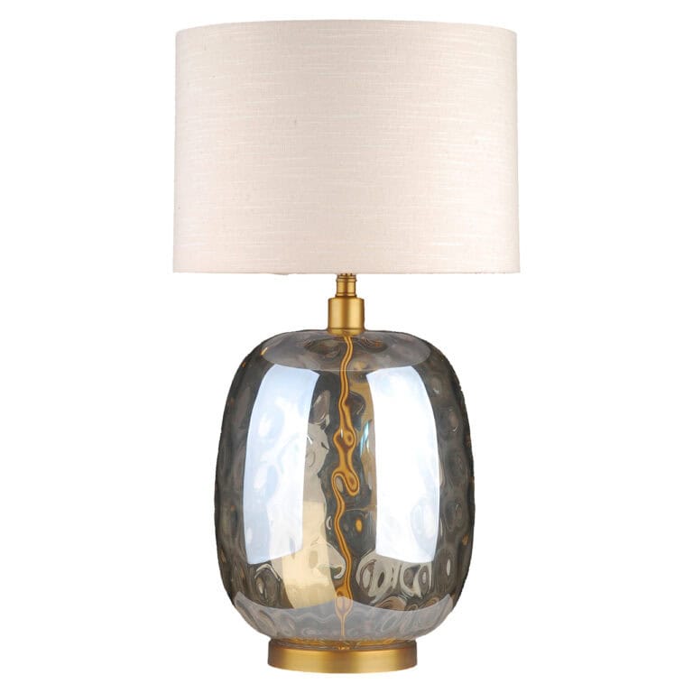 Elegante Tischlampe in Bernstein mit Glasfuß und Stoffschirm.