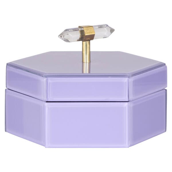 Boîte de rangement Lila « Jutta » avec un bouton doré et une poignée en cristal.