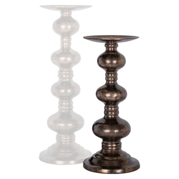 Small copper-colored Joya Candle holders  for interior decoration.