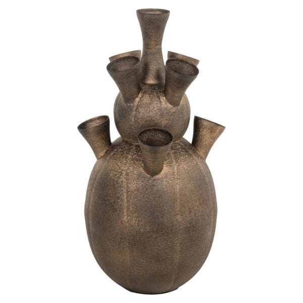Antique brass vase with multiple openings, unique design.