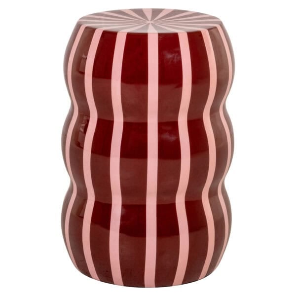 Modern red side table with wavy lines for interior decoration.