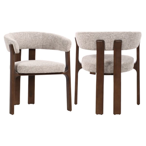 Contigo dining chair with beige upholstery and wooden legs.