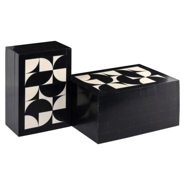 Set aus zwei schwarzen und weißen Aufbewahrungsboxen mit geometrischem Muster.