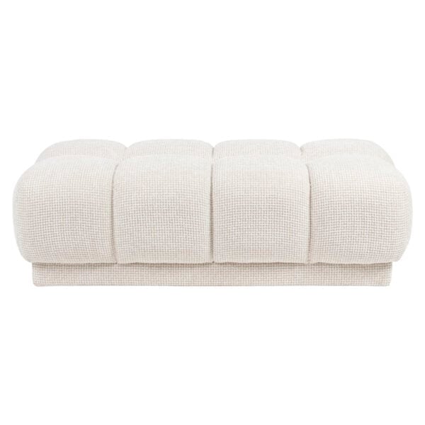 Pouf et repose-pieds beige clair en tissu « blockweave », design moderne.
